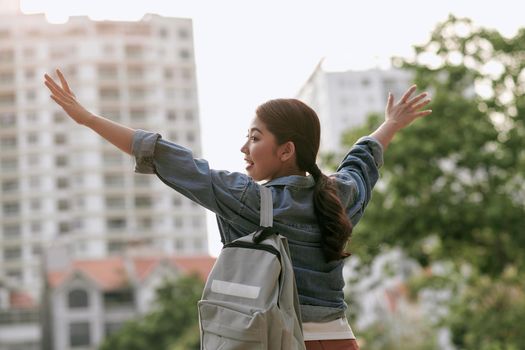 Joyful asian girl posing with soft sun light. Space for text