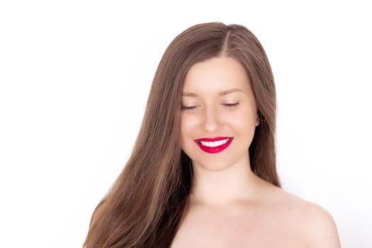 Happy smiling young woman with perfect white teeth and beautiful healthy smile, clean skin and natural makeup, female face portrait with positive emotion, beauty, wellness and skincare ad.