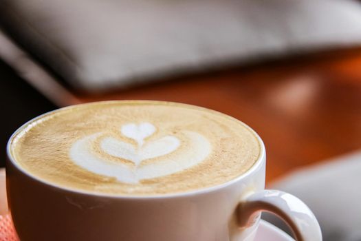 Large white cup of coffee latte and pattern, copy space