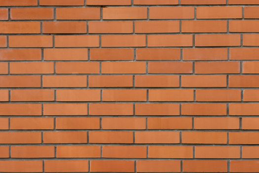 Orange brick wall surface. Brick wall backdrop with space for text