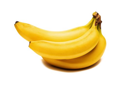 Bright yellow banana, isolate on a white background, close up