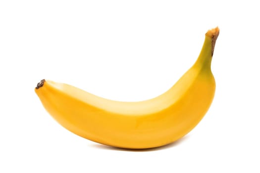 Bright yellow banana, isolate on a white background, close up