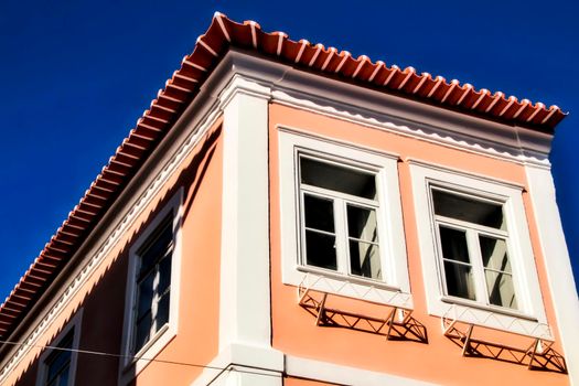 Beautiful and old colorful typical facade next to the water canal in Aveiro village in January