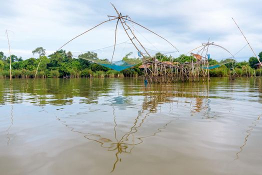 Yok Yor, is a fishing with local wisdom. Tool for capture aquatic animals of native people made of bamboo and net are trap rural lifestyle at Pakpra canal, Baan Pak Pra, Phatthalung, Thailand