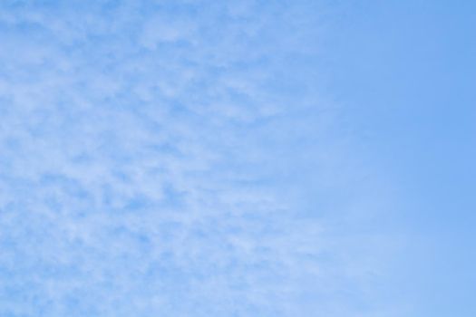 Background of blue sky with white clouds.