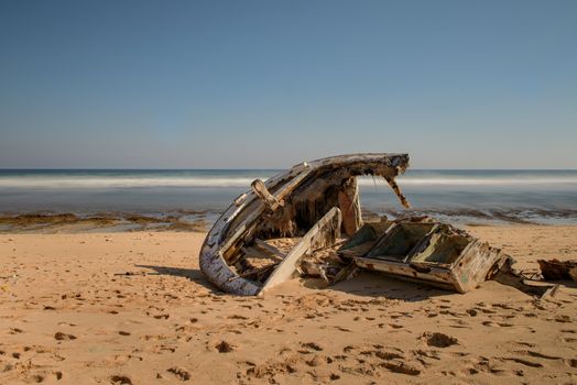 Sunken ship on the shores of Nyang Nyang Beach in Bali, Indonesia.