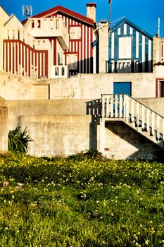 Beautiful and colorful striped facades in Costa Nova beach in Aveiro, Porto, Portugal.