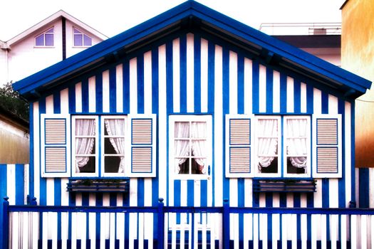 Beautiful and colorful striped facades in Costa Nova beach in Aveiro, Porto, Portugal.