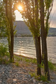 Golden sunset on Osoyoos lake from Haynes point in Swiws park.