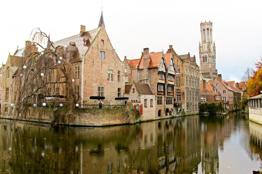 Brugge/Belgium - Autumn. Old town buildings on the canal. Beautiful reflection