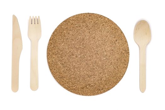 wooden cutlery and cork plate