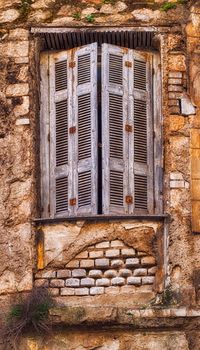 old house in disrepair, window close up