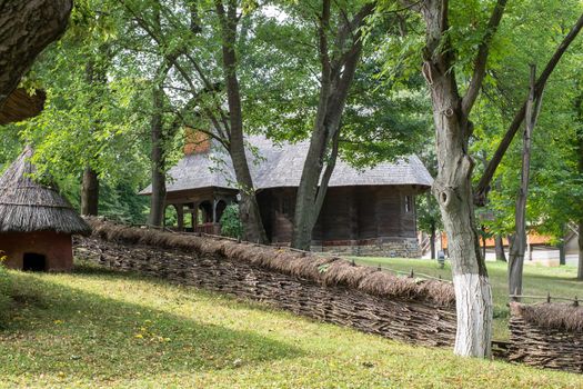 Bucharest, Romania, September 5, 2017. Authentic peasant farms and houses from all over Romania in Dimitrie Gusti National Village Museum, an open-air ethnographic museum located in the Herastrau Park showcasing traditional Romanian village life