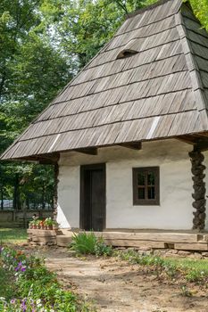 Bucharest, Romania, September 5, 2017. Authentic peasant farms and houses from all over Romania in Dimitrie Gusti National Village Museum, an open-air ethnographic museum located in the Herastrau Park showcasing traditional Romanian village life