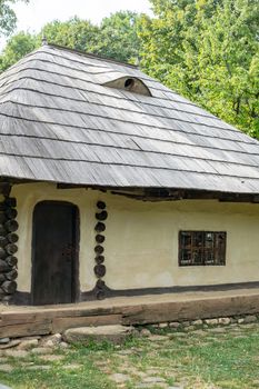 Bucharest, Romania, September 5, 2017. Authentic peasant farms and houses from all over Romania in Dimitrie Gusti National Village Museum, an open-air ethnographic museum located in the Herastrau Park showcasing traditional Romanian village life