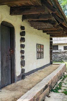 Bucharest, Romania, September 5, 2017. Authentic peasant farms and houses from all over Romania in Dimitrie Gusti National Village Museum, an open-air ethnographic museum located in the Herastrau Park showcasing traditional Romanian village life