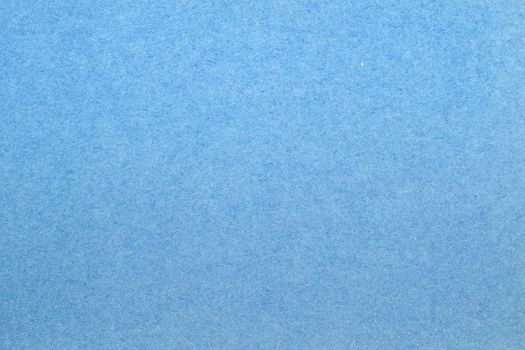 A dense industrial sheet of grey paper with a textured surface