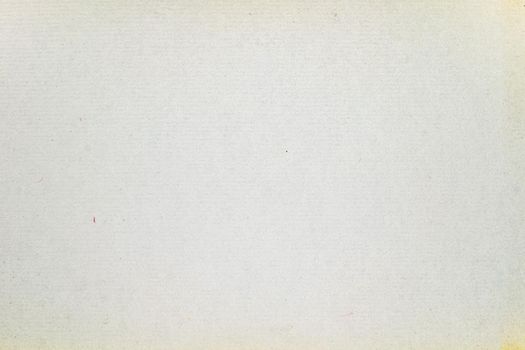 A dense industrial sheet of grey paper with a textured surface