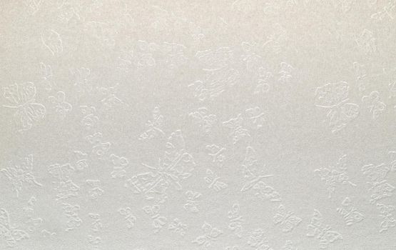 A dense industrial sheet of grey paper with a textured surface