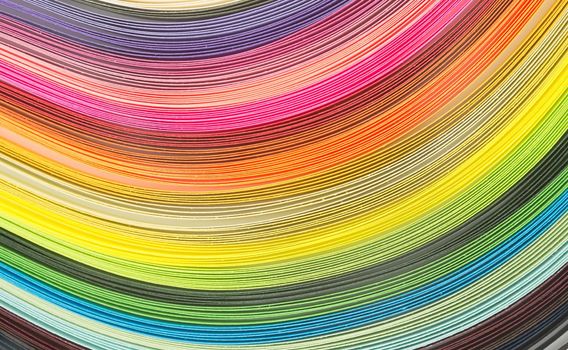 Abstract color wave curl rainbow strip paper on white background