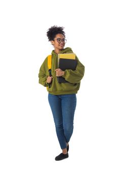 Full length portrait of pretty female african american university student isolated on white background