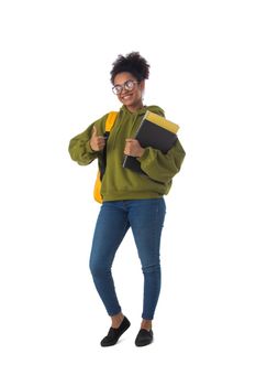 Full length portrait of pretty female african american university student with thumb up isolated on white background