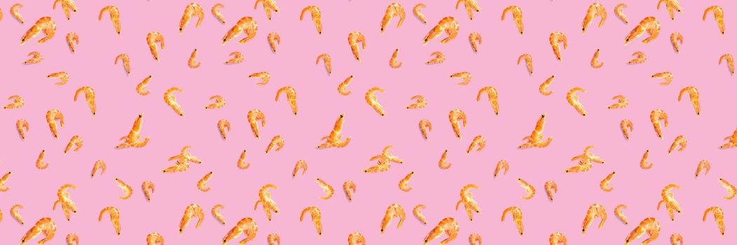 Tiger shrimp. Seafood background made from Prawns isolated on a pink backdrop. modern flat lay background from boiled shrimps, Seafood. not seamless pattern