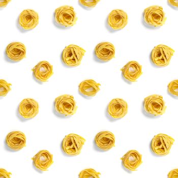 Seamless pattern from Italian tagliatelle pasta. raw pasta fettuccine, pop art background, flat lay. Italian raw nest pasta isolated on white.