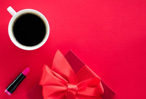 Romantic celebration, lifestyle and birthday present concept - Luxury beauty gift box and coffee on red, flatlay