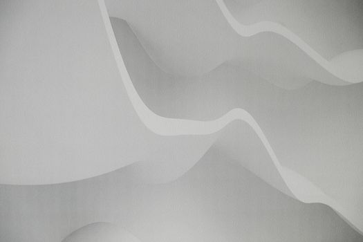 Modern wall wallpaper texture for background. Home decoration, abstraction, structure of waves or hills, gray and white.