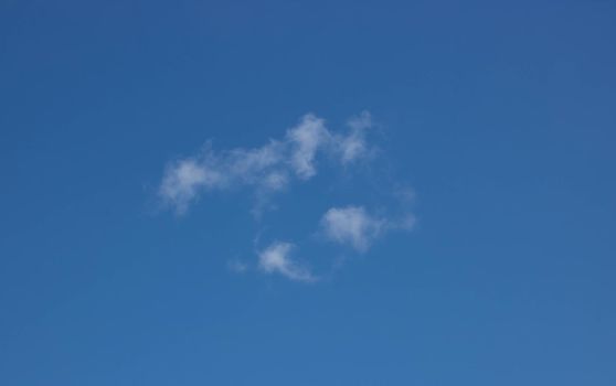 Beautiful blue sky and light white clouds. Nature Background.