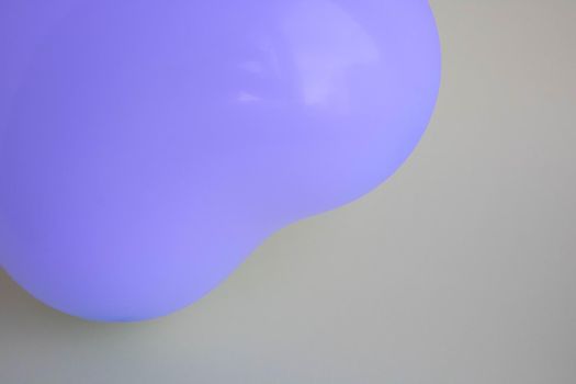 Purple balloon in the shape of a heart on a gray background. Wedding concept, Valentine's Day, photo zone, lovers. Banner. top view.