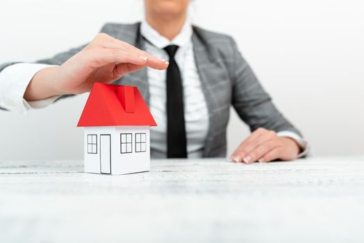 Lady Presenting New Home Insurance Deals In Outfit, Business Woman Showing Possible Mortegage Oppurtiunities For New House, Installments Caculated For Recent Apartments Coverage.