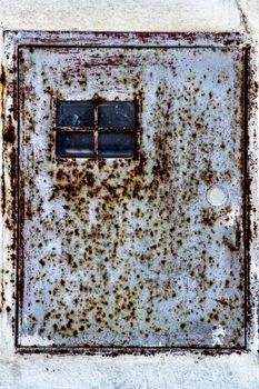 Colorful texture of old paint on rusty metal light box