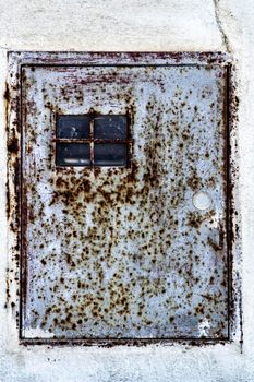 Colorful texture of old paint on rusty metal light box