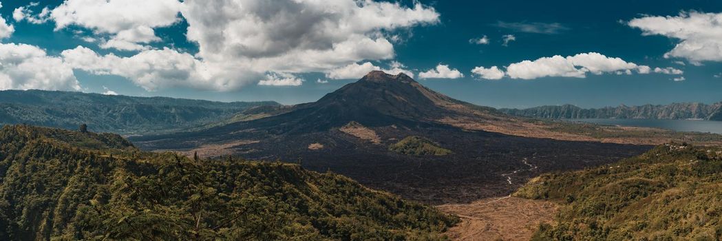 Mount Batur volcano and Agung mountain panoramic view with blue sky from Kintamani, Bali, Indonesia