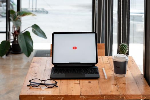 CHIANG MAI, THAILAND - MAY 23, 2021: iPad Pro on table with Youtube logo, iPad Pro was created and developed by the Apple inc.