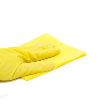 a man's hand in a yellow glove holds yellow cleaning cloth isolated on a white background.