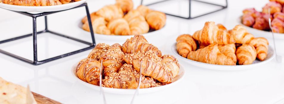Pastry, cookies and croissants, sweet desserts served at charity event - food, drinks and menu concept as holiday background banner for luxury brand design