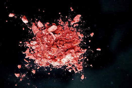 Crushed cosmetics, mineral organic eyeshadow, blush and cosmetic powder isolated on black background, makeup and beauty banner, flatlay design.