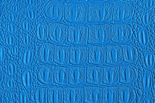 Blue crocodile leather texture. Abstract background for design.