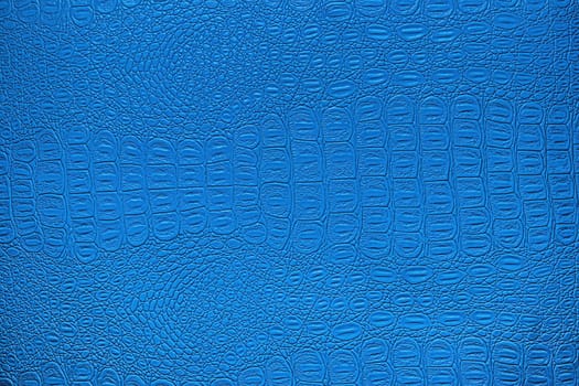 Blue crocodile leather texture. Abstract background for design.