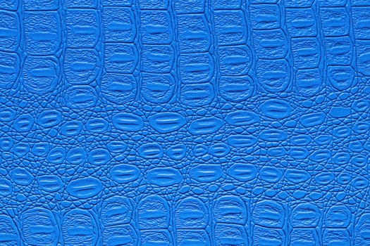 Blue crocodile leather texture. Abstract background for design.