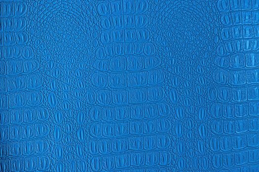 Blue crocodile leather texture. Abstract background for design.