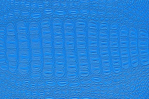 Blue crocodile leather texture. Abstract background for design.