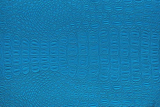 Blue crocodile leather texture. Abstract background for design.