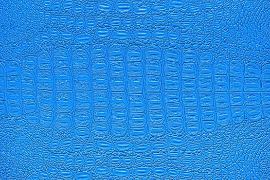 Blue crocodile leather texture. Abstract background for design.