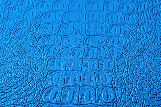 Blue crocodile leather texture. Abstract background for design.