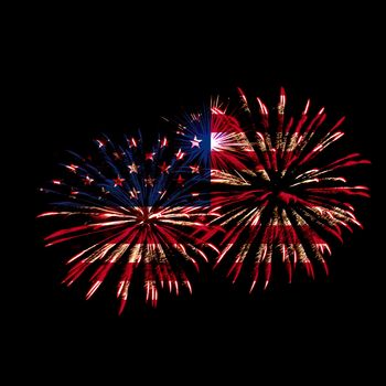 Concept of celebrating Independence Day in United States of America. USA national flag with fireworks background for 4th of July.