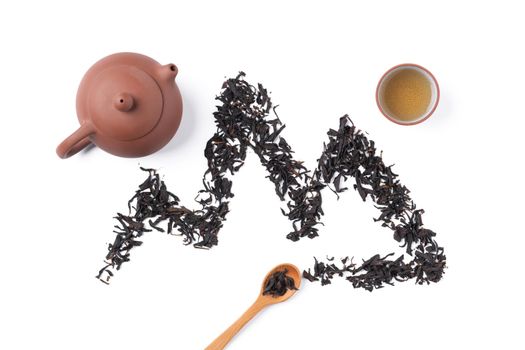 Top view of fresh black tea with kettle teapot and leaves in Taiwan, Asian culture design concept layout.